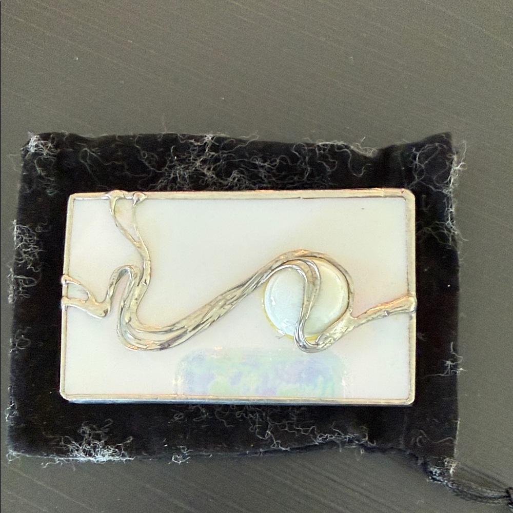 Stylish Silver and White handcrafted mirror.